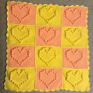 Crocheted heart baby blanket